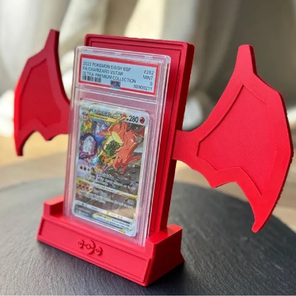 Pokemon Trading Card with Red Dragon Wings Display